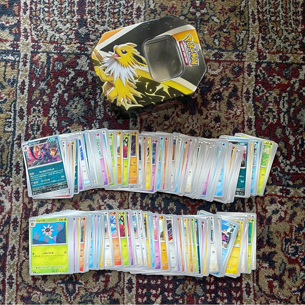 Japanese Pokemon Card Lot Set with Yellow and Black Tin